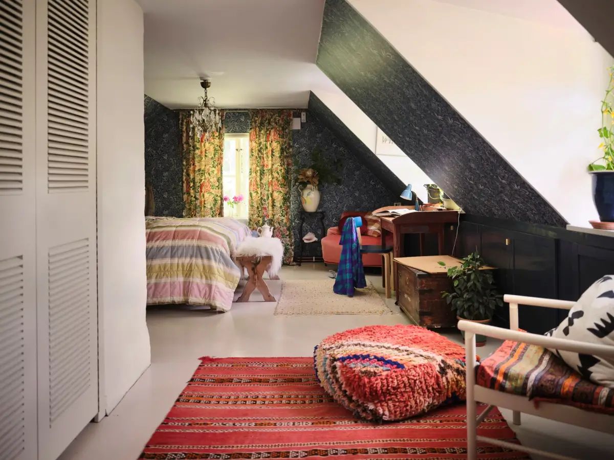 A Colorful Family Home in an Old Gardener's Cottage in Sweden 31 bedroom dark blue wallpaper