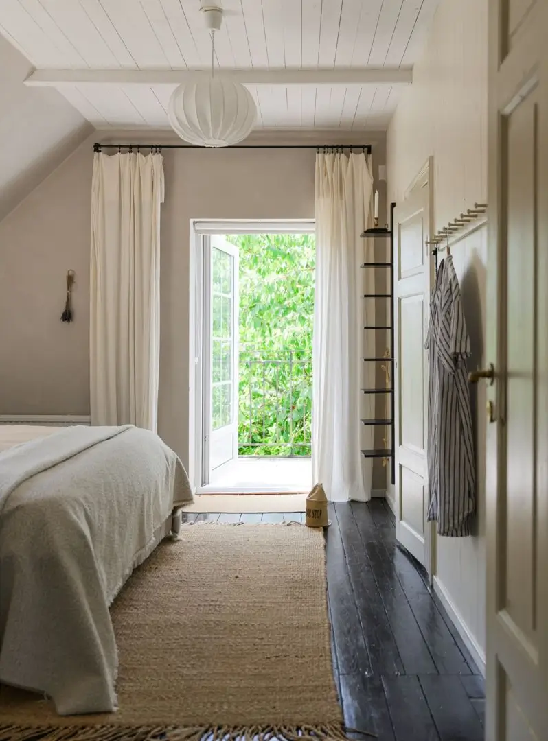Historic Character and a deVOL Kitchen in a Swedish Country House 27 bedroom dark wooden floorboards