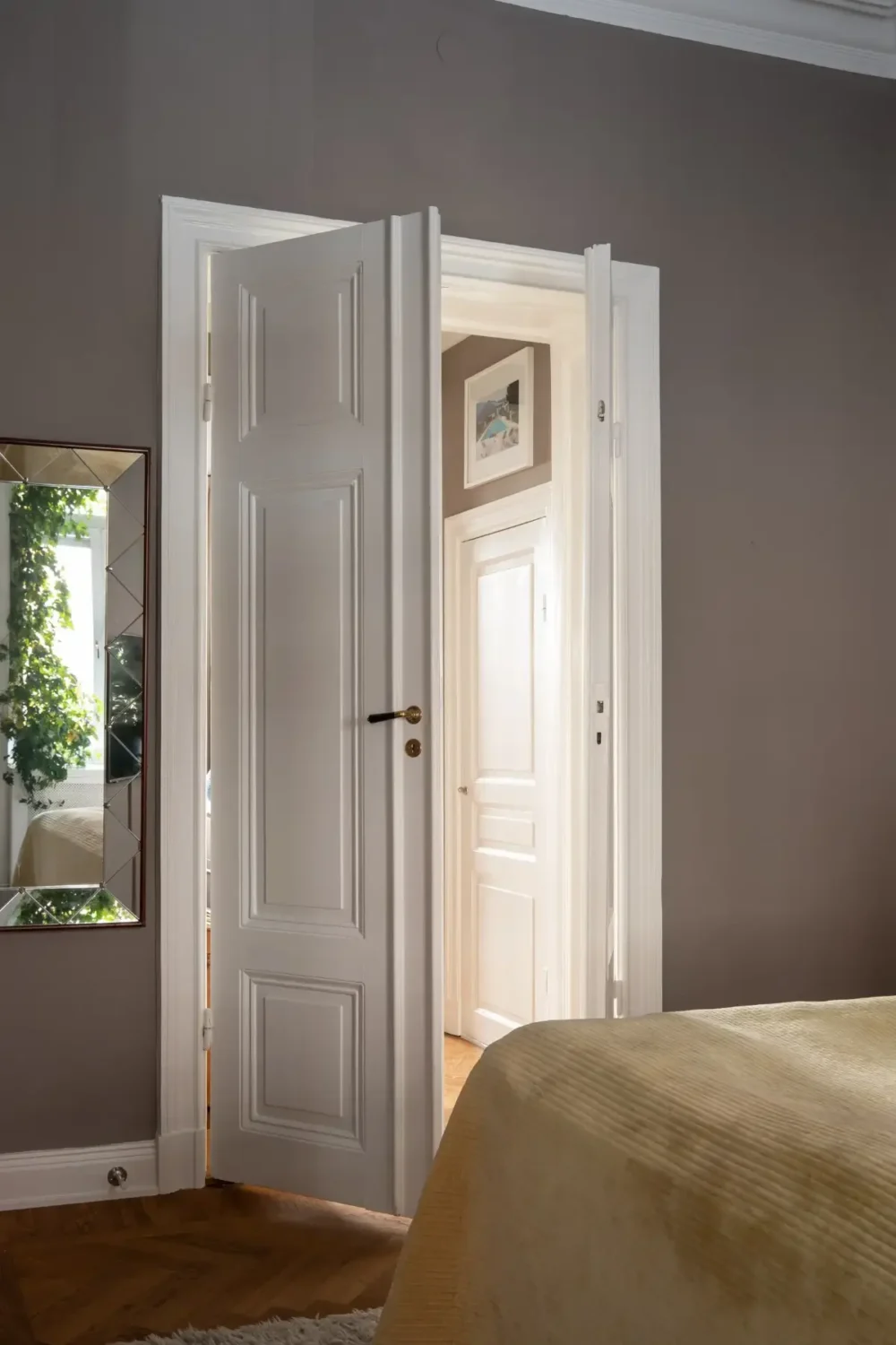 Arched Windows and Design Classics in a 19th Century Apartment 15 bedroom doors