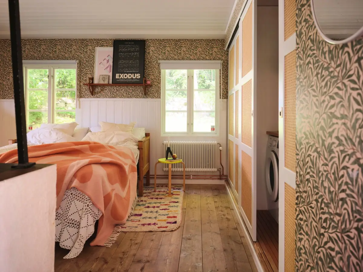 A Colorful Family Home in an Old Gardener's Cottage in Sweden 21 bedroom william morris wallpaper