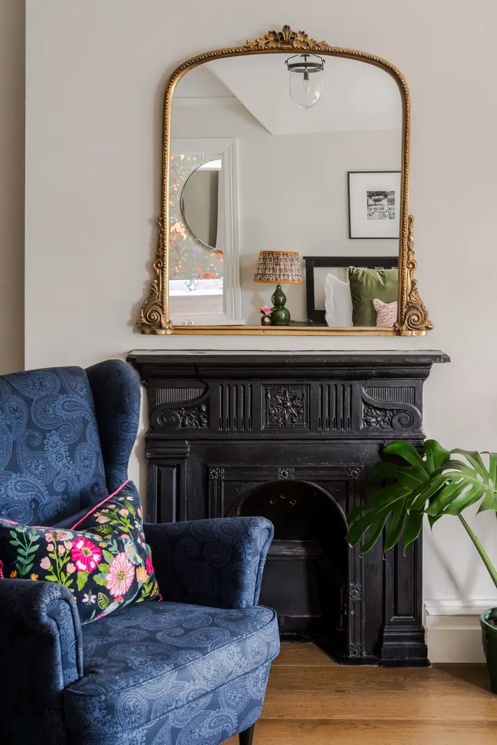 A Three-Bedroom Duplex Apartment with a Large Roof Terrace in London 15 black fireplace