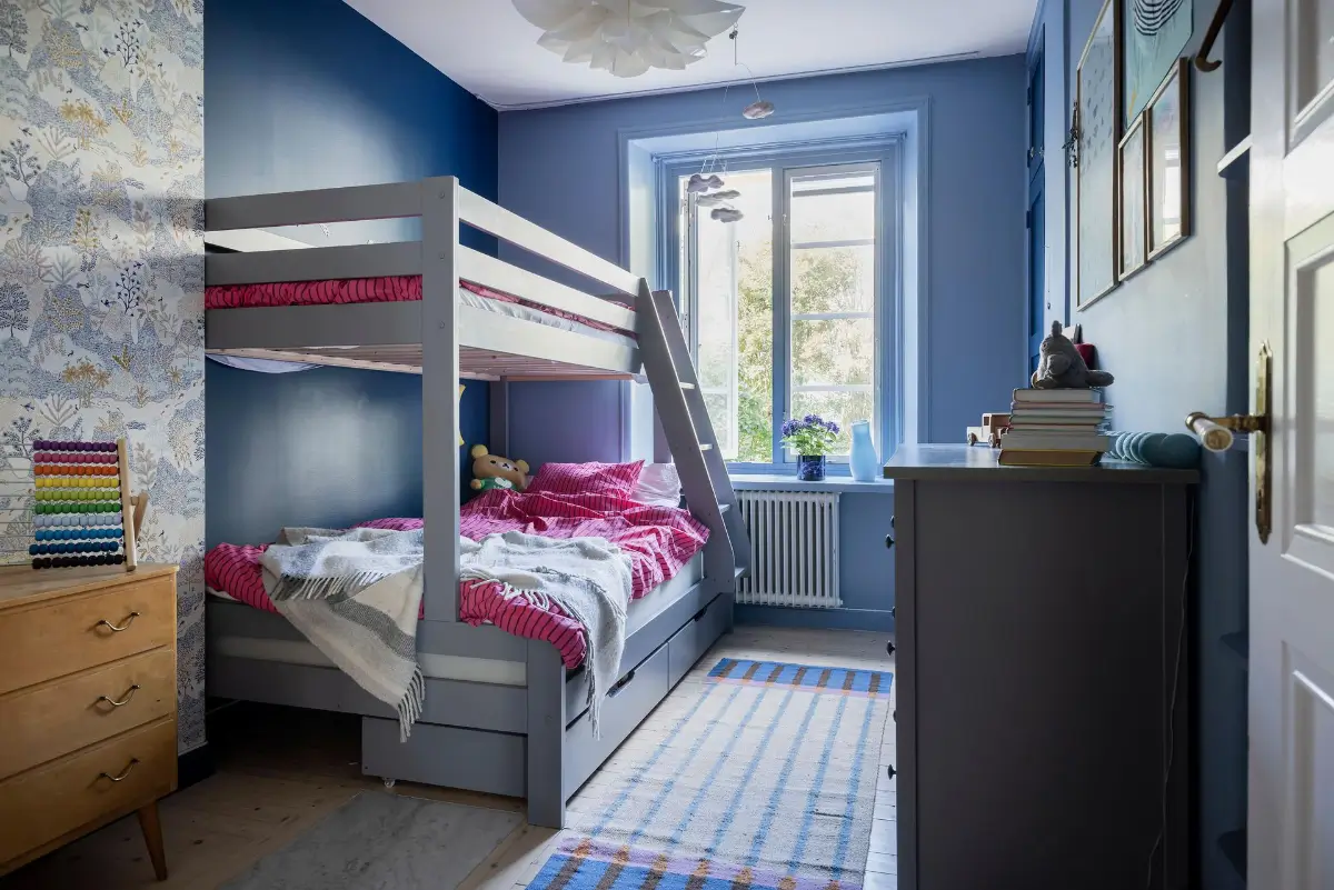 A Colorful 1920s Family Apartment in Sweden 29 blue kids bedroom bunk beds