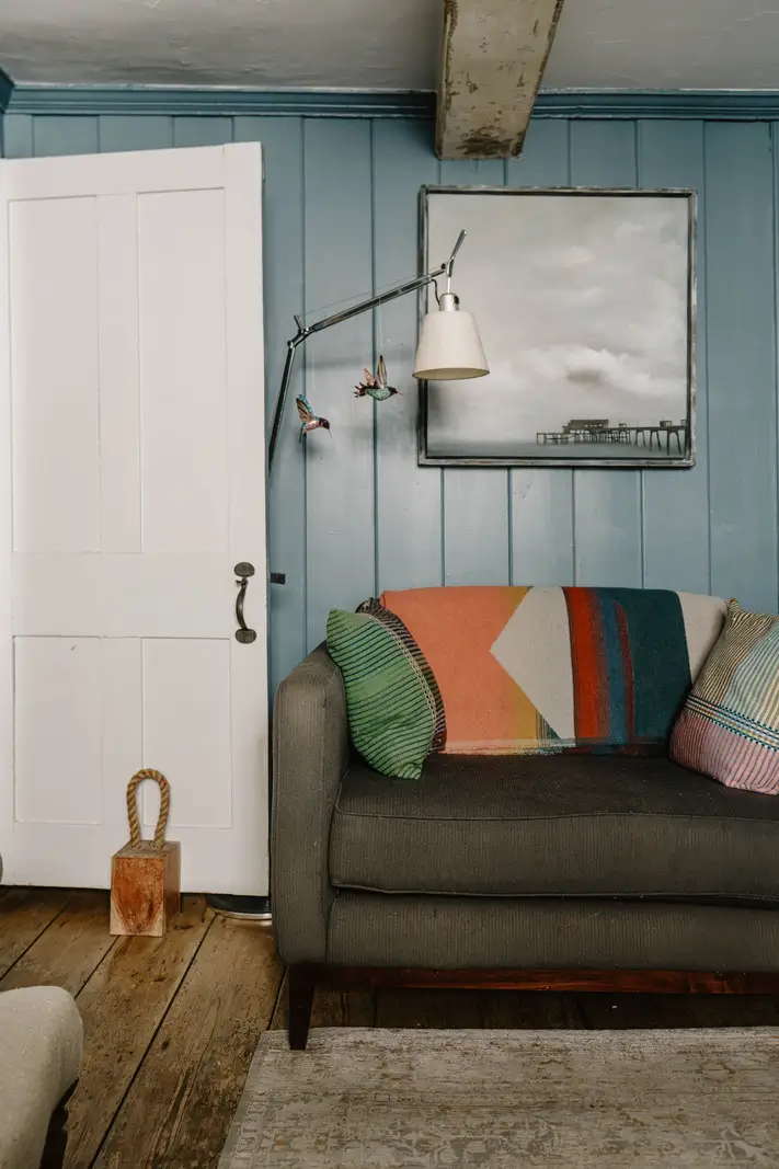 A 17th-Century Home with Original Elements in an English Seaside Town 3 blue living room wall paneling