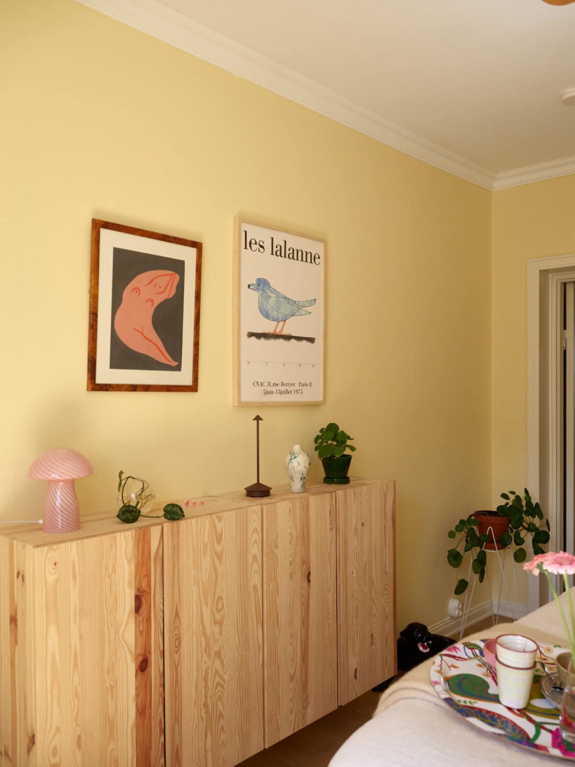 A Stockholm Apartment with a Butter-Yellow Bedroom 18 butter yellow bedroom ikea ivar cabinets