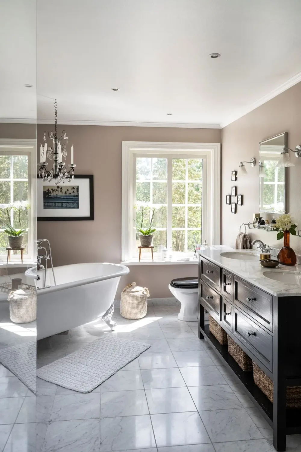 Scandinavian Design Meets The Hamptons in a Swedish Country House 44 classic bathroom marble tiles freestanding bath walk-in shower double sinks nordroom