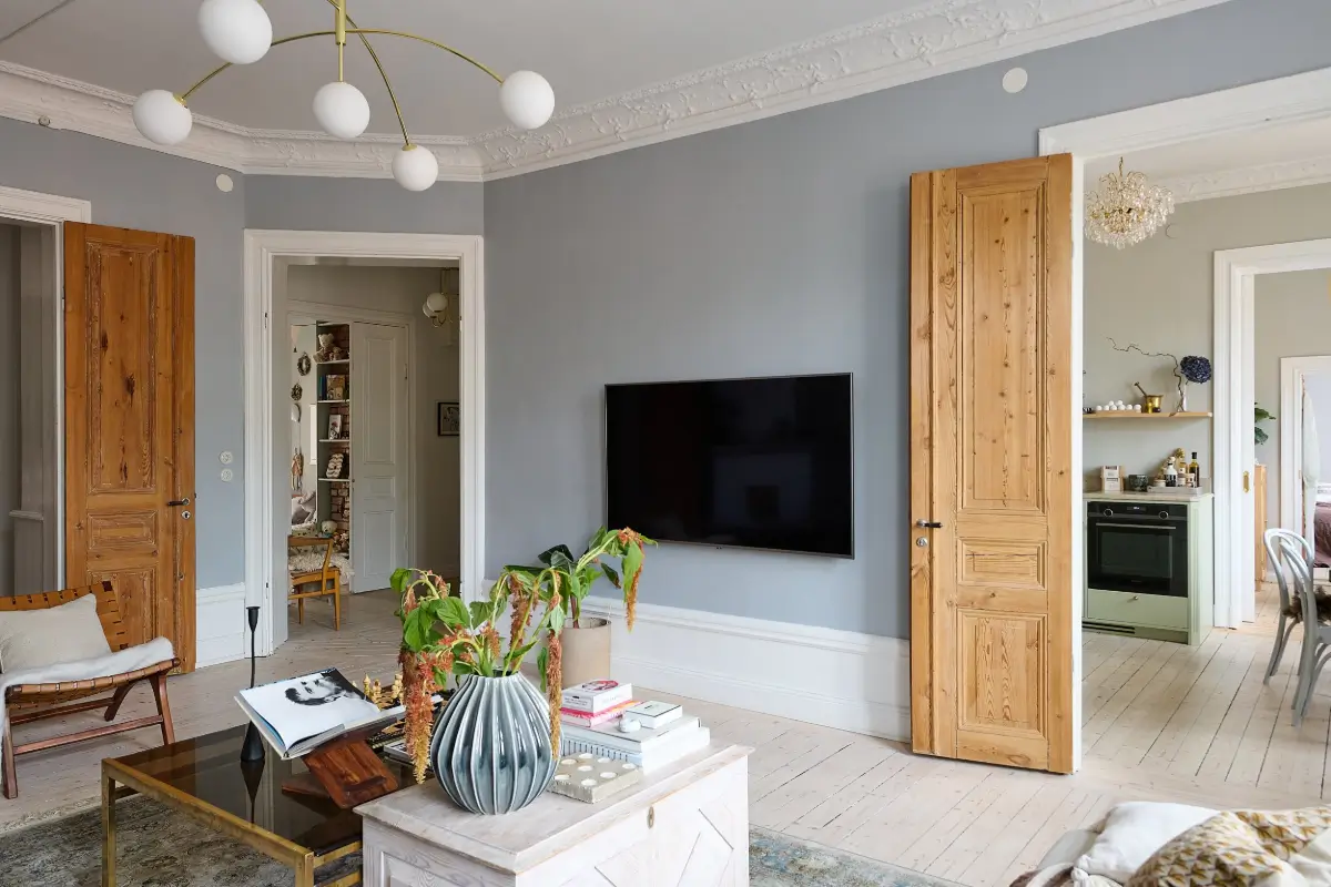 A Classic Stockholm Family Apartment with a Separate Studio 4 classic living room stucco wooden doors