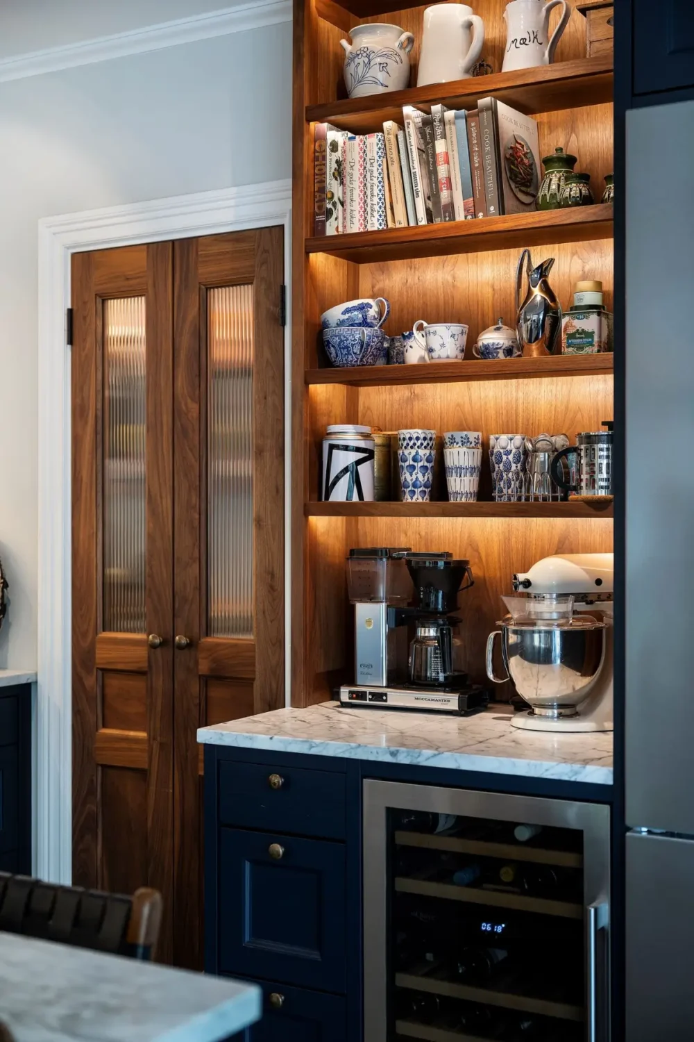 Scandinavian Design Meets The Hamptons in a Swedish Country House 21 coffee corner lighted shelves nordroom