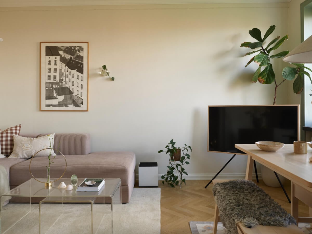 A Stockholm Apartment with a Butter-Yellow Bedroom 1 contemporary light-colored scandinavian living room