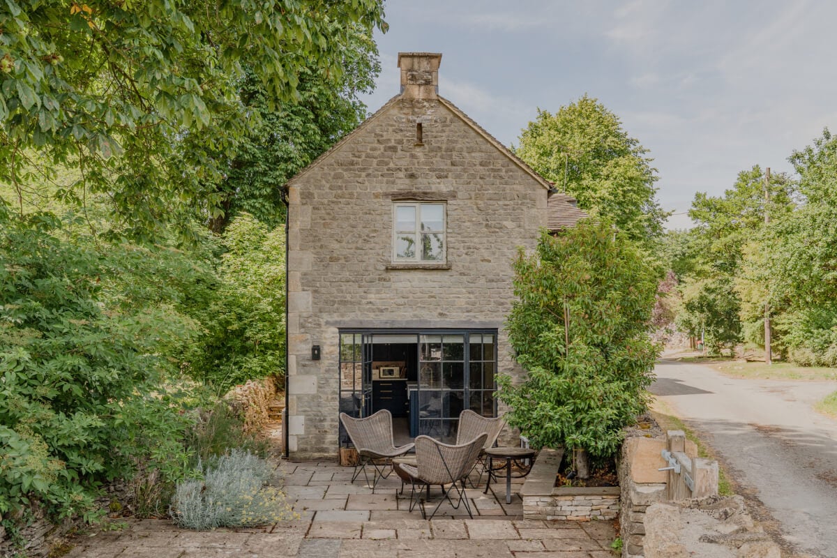 A Stone English Cottage with a Blue and Pink Kitchen 21 cottage garden stone terrace A Stone English Cottage with a Blue and Pink Kitchen