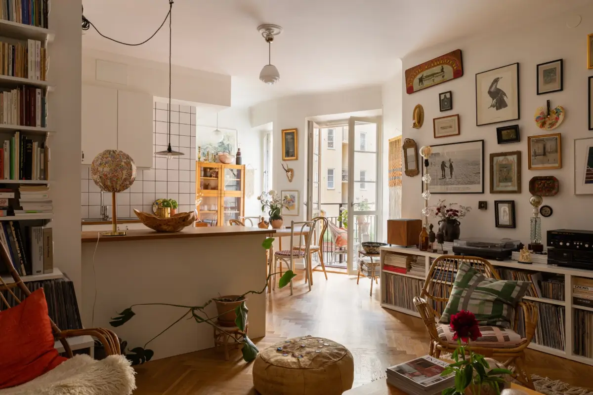 A Cozy 1920s Apartment Filled with Books, Art, and Music 6 cozy open-plan living room