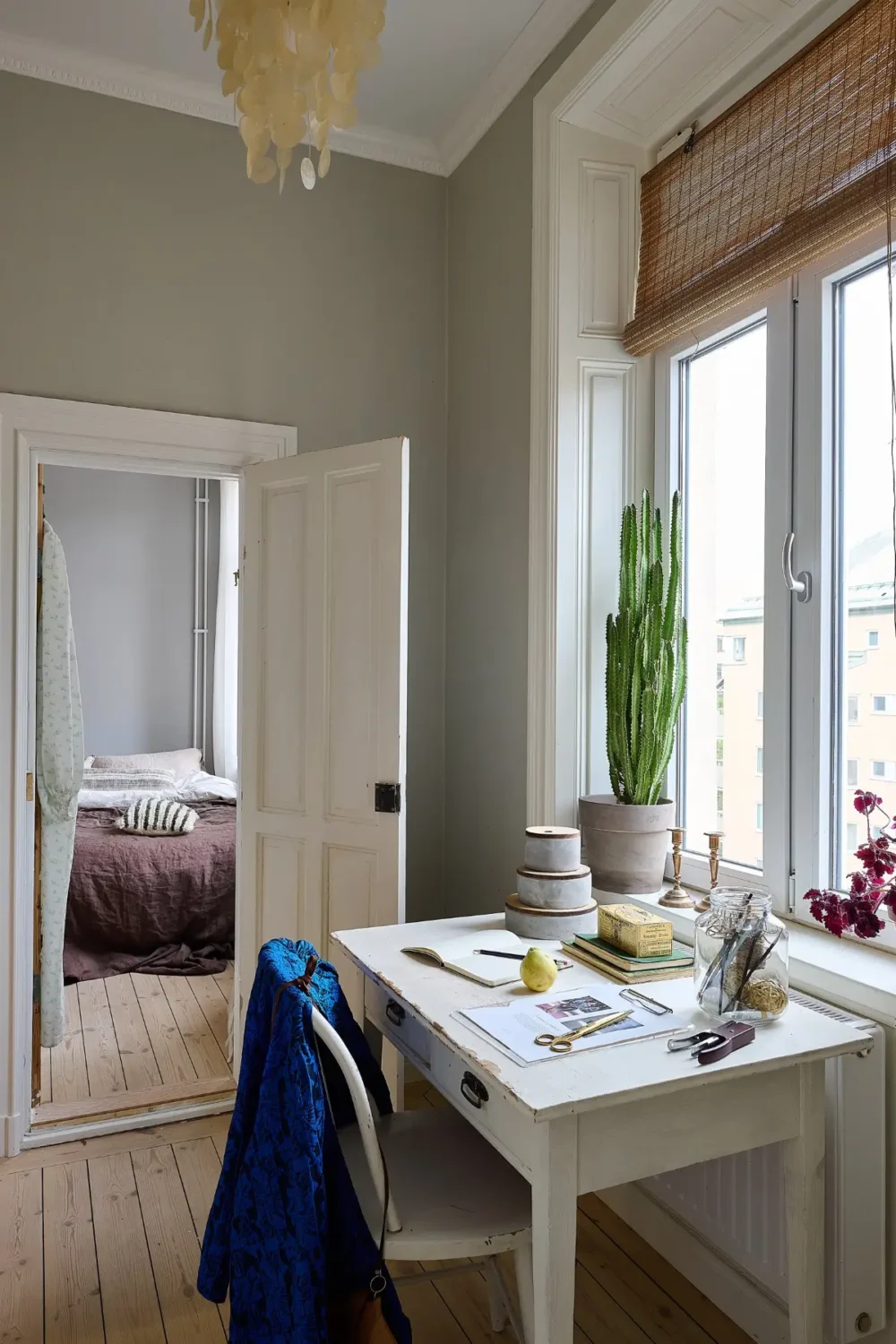 A Classic Stockholm Family Apartment with a Separate Studio 34 desk under window