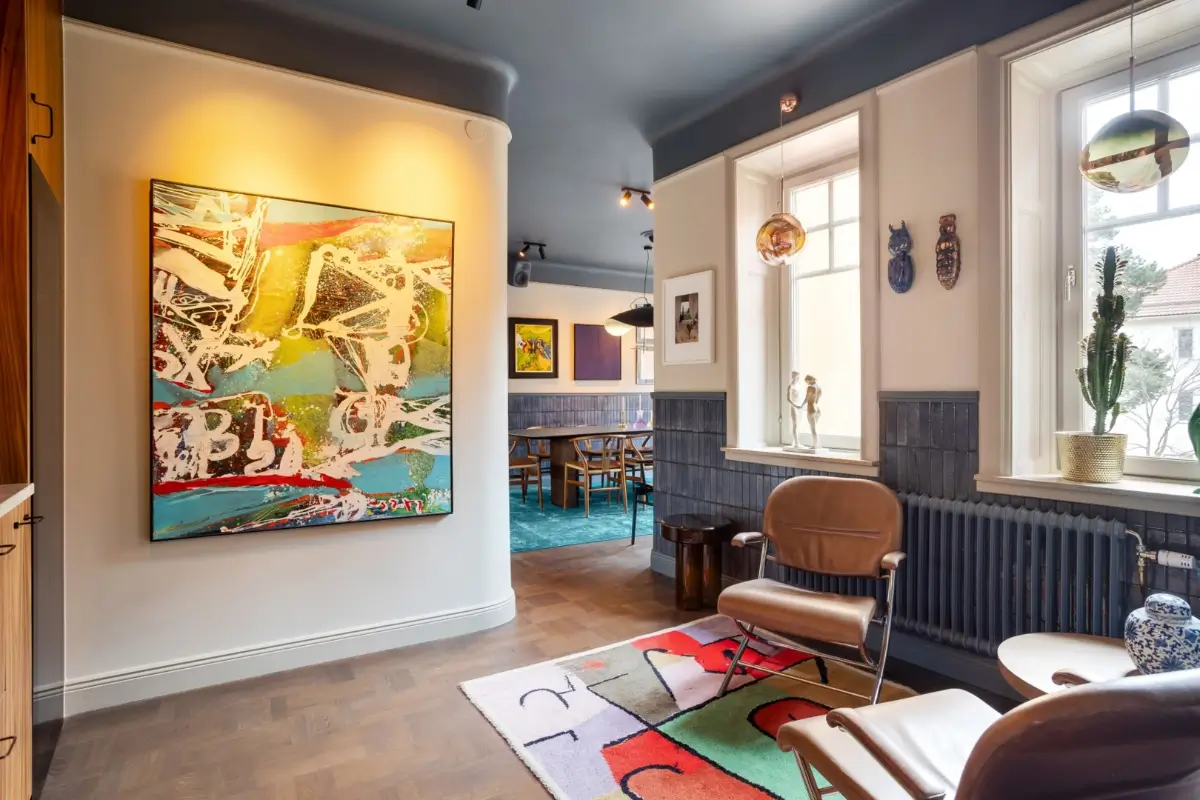 A Harmonious Color Palette in a Luxurious Stockholm Duplex Apartment 6 dining room with home bar tiled walls