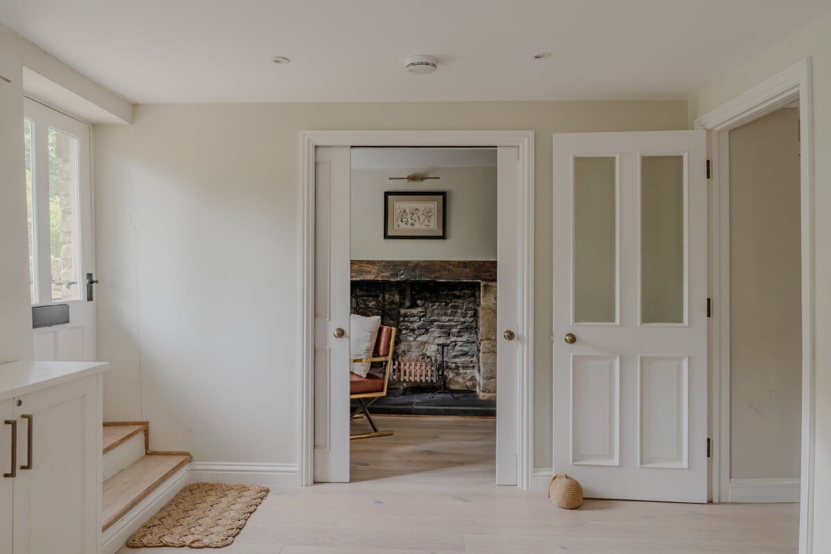 A Stone English Cottage with a Blue and Pink Kitchen 9 entry hall