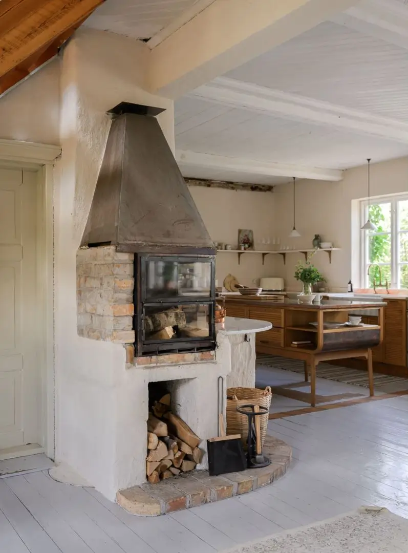 Historic Character and a deVOL Kitchen in a Swedish Country House 5 fireplace