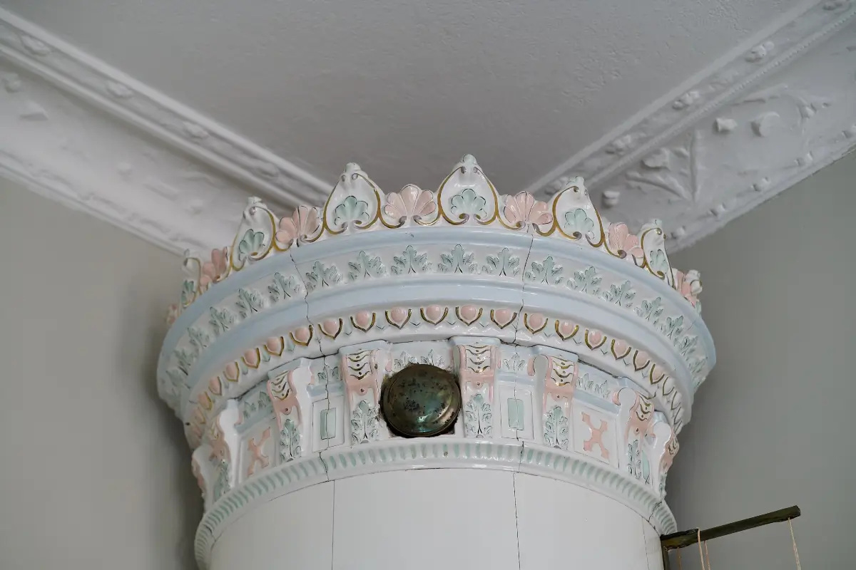 A Classic Stockholm Family Apartment with a Separate Studio 11 fireplace detail pastel tones