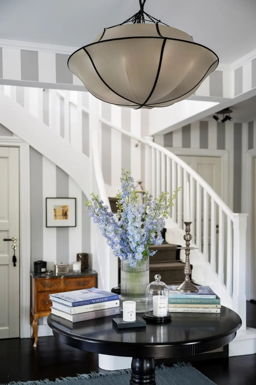 Scandinavian Design Meets The Hamptons in a Swedish Country House 30 foyer round table striped wallpaper