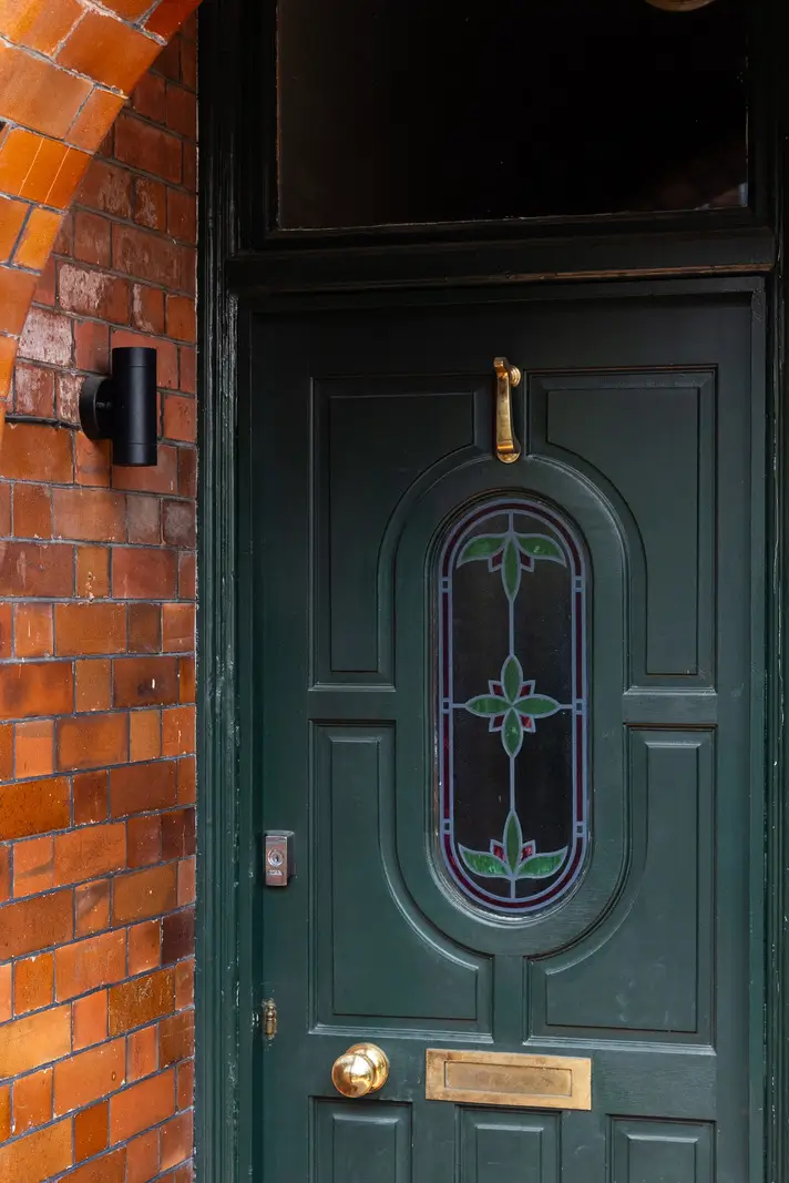 A Modern Extension and Period Details in a Ground Floor London Home 19 front door stained glass