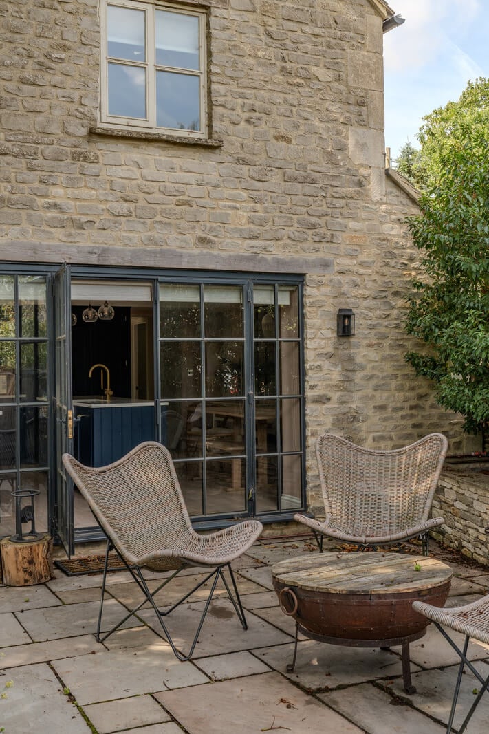 A Stone English Cottage with a Blue and Pink Kitchen 7 garden terrace A Stone English Cottage with a Blue and Pink Kitchen