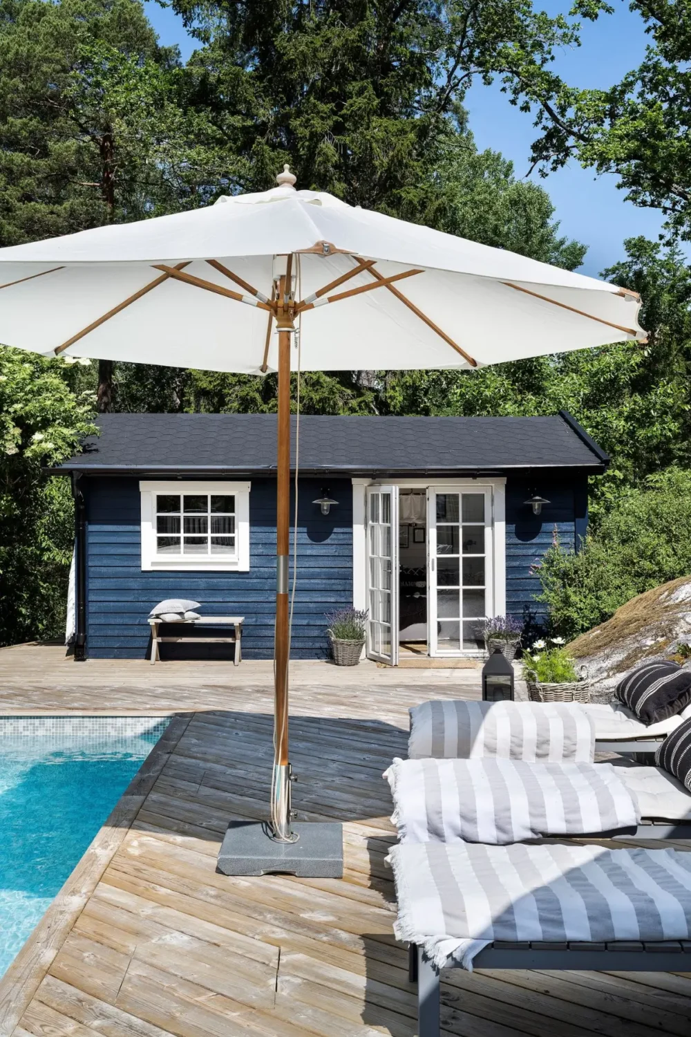 Scandinavian Design Meets The Hamptons in a Swedish Country House 53 garden with guest house