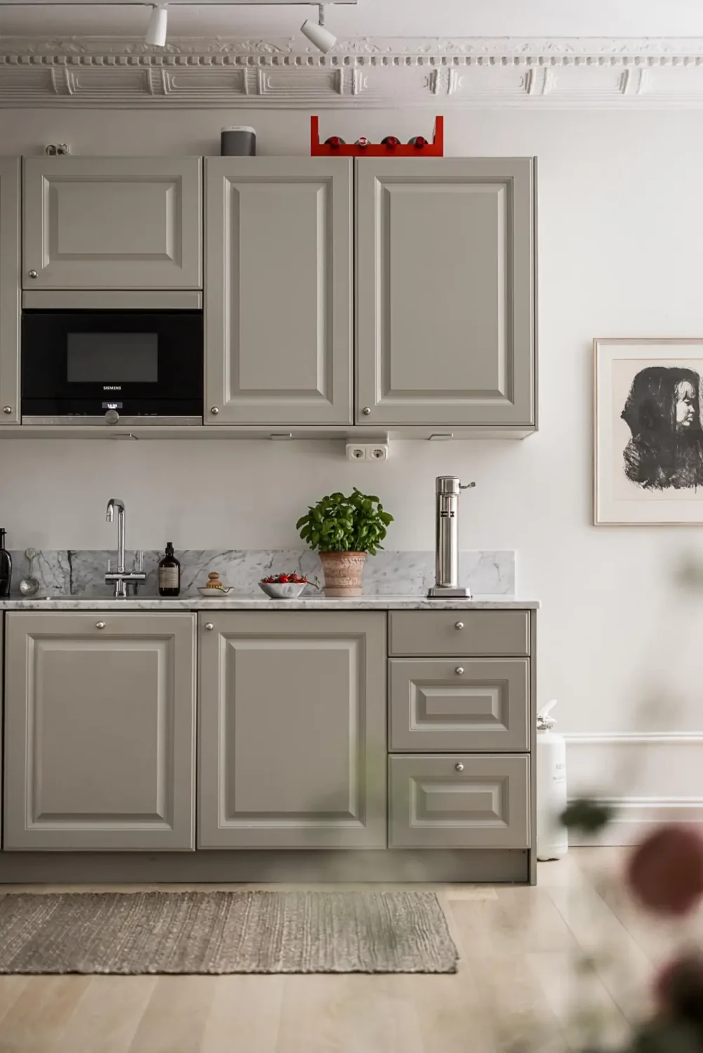 Classic Period Elements in a Comfortable Two-Bedroom Apartment 4 gray kitchen cabinets