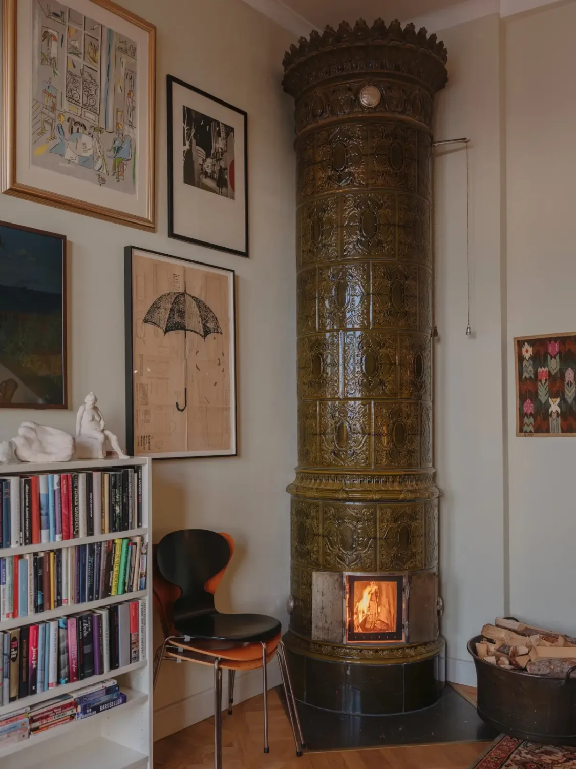 A Classic Late 19th Century Apartment with Magnificent Views of Stockholm 13 green fireplace open bookcases
