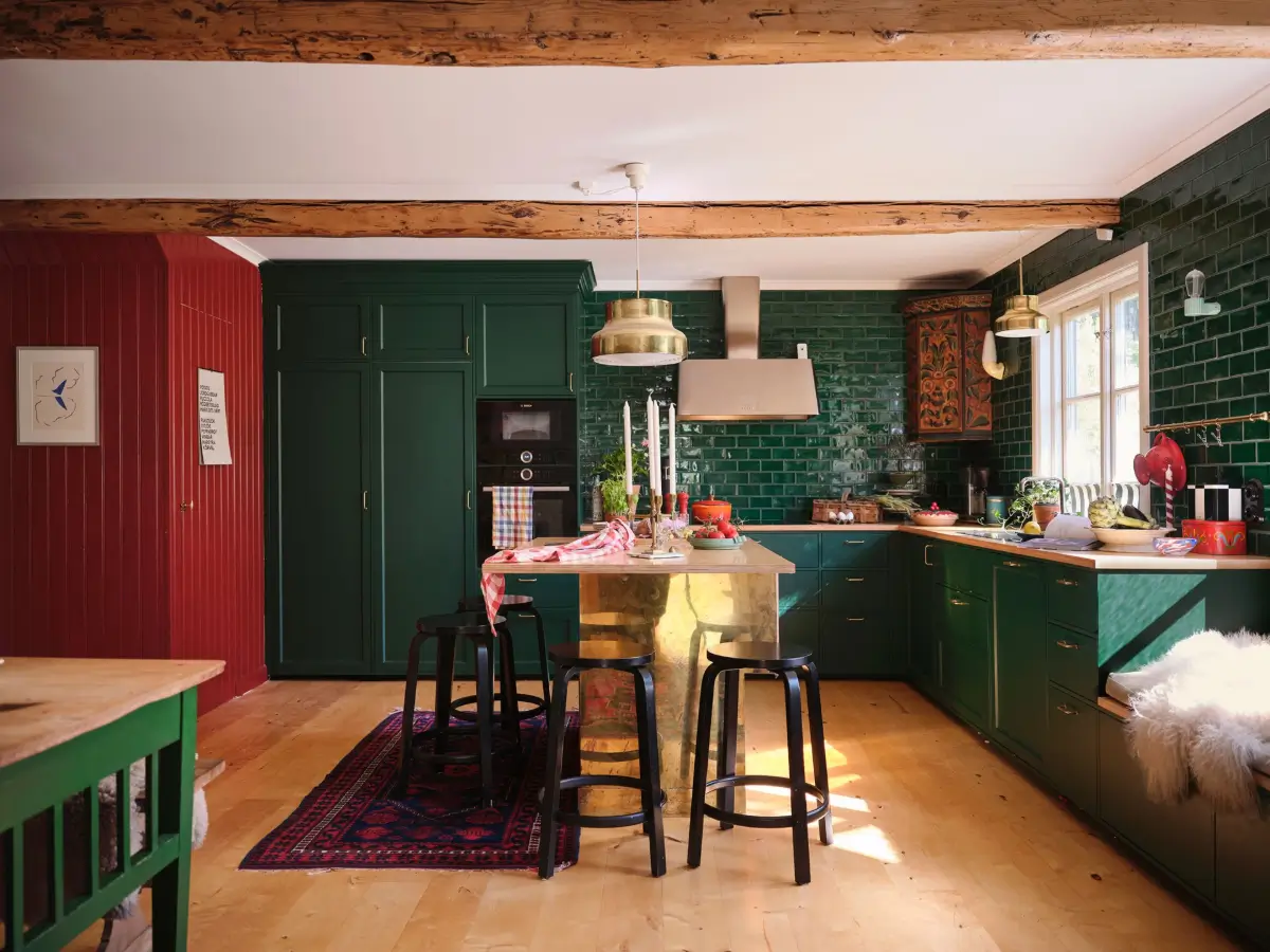 A Colorful Family Home in an Old Gardener's Cottage in Sweden 4 green kitchen with island