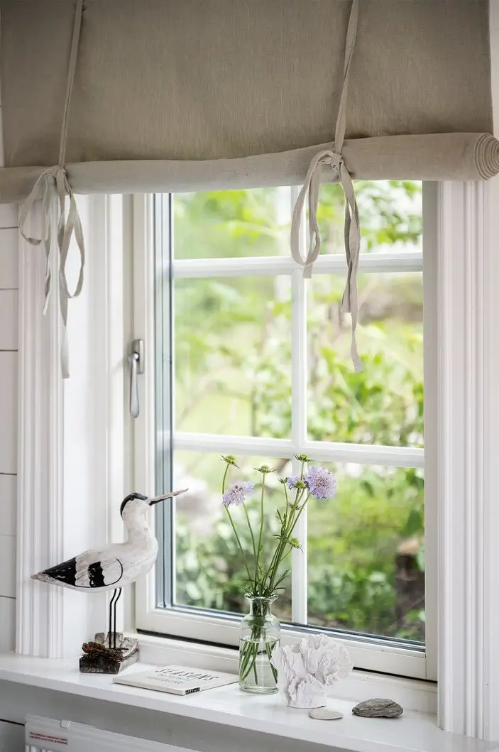Scandinavian Design Meets The Hamptons in a Swedish Country House 57 guest house window