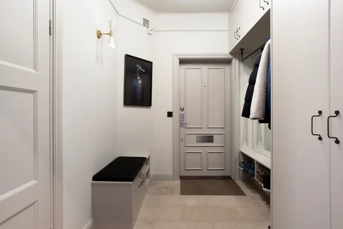 A Harmonious Color Palette in a Luxurious Stockholm Duplex Apartment 29 hall gray built in cabinets nordroom A Harmonious Color Palette in a Luxurious Stockholm Duplex Apartment
