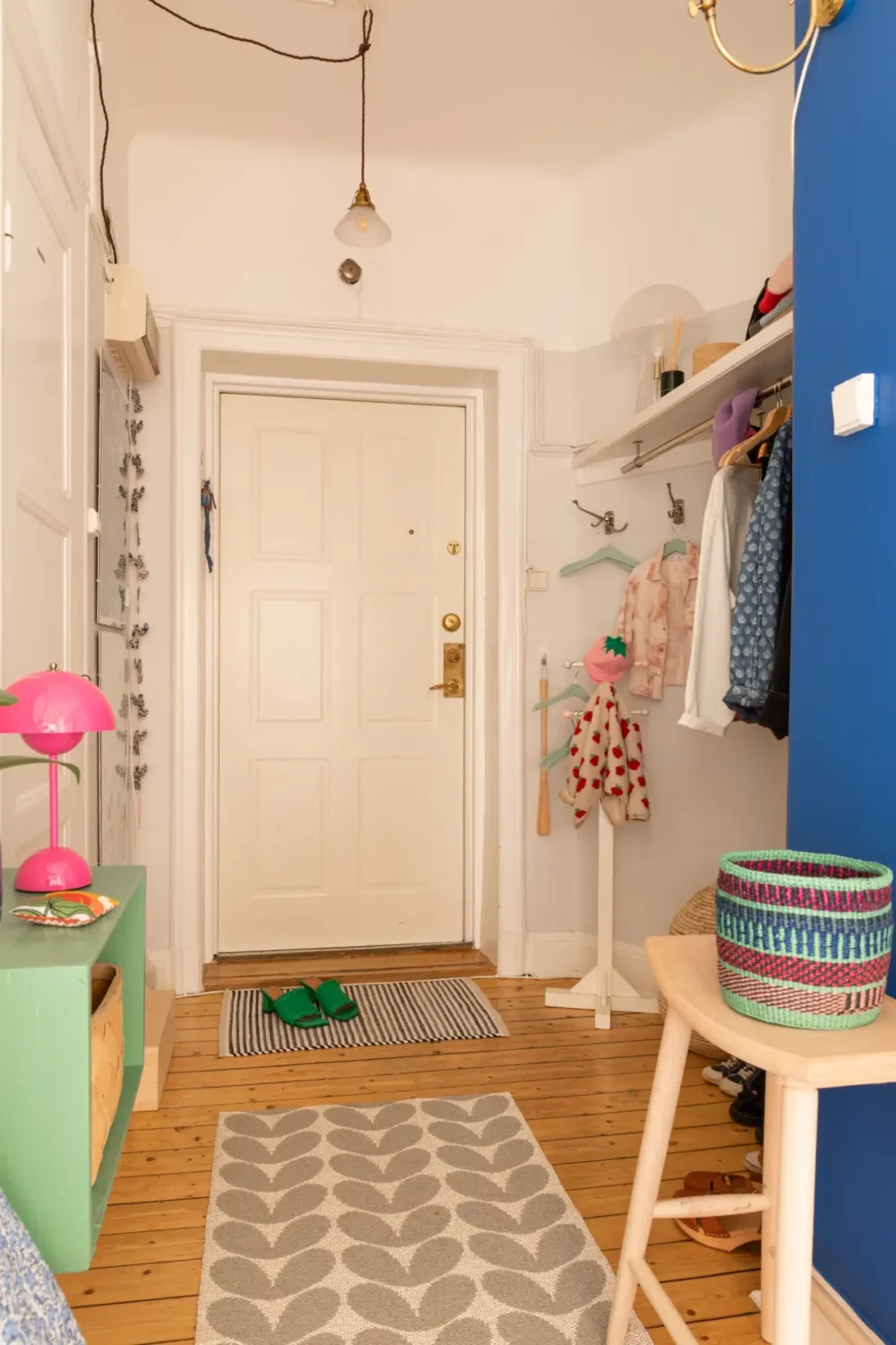 A Cozy Colorful Family Apartment with an Industrial Room Divider 22 hall with niche for coats and shoes nordroom A Cozy Colorful Family Apartment with an Industrial Room Divider