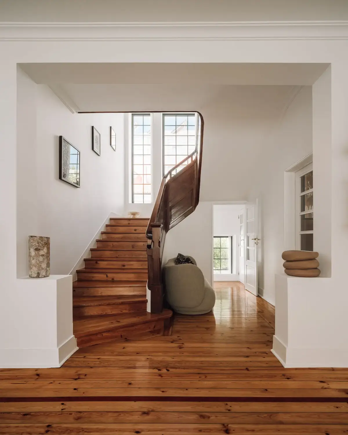 An Art Deco Villa with a Moroccan-Inspired Garden in Portugal 8 hall with wooden sculptural staircase