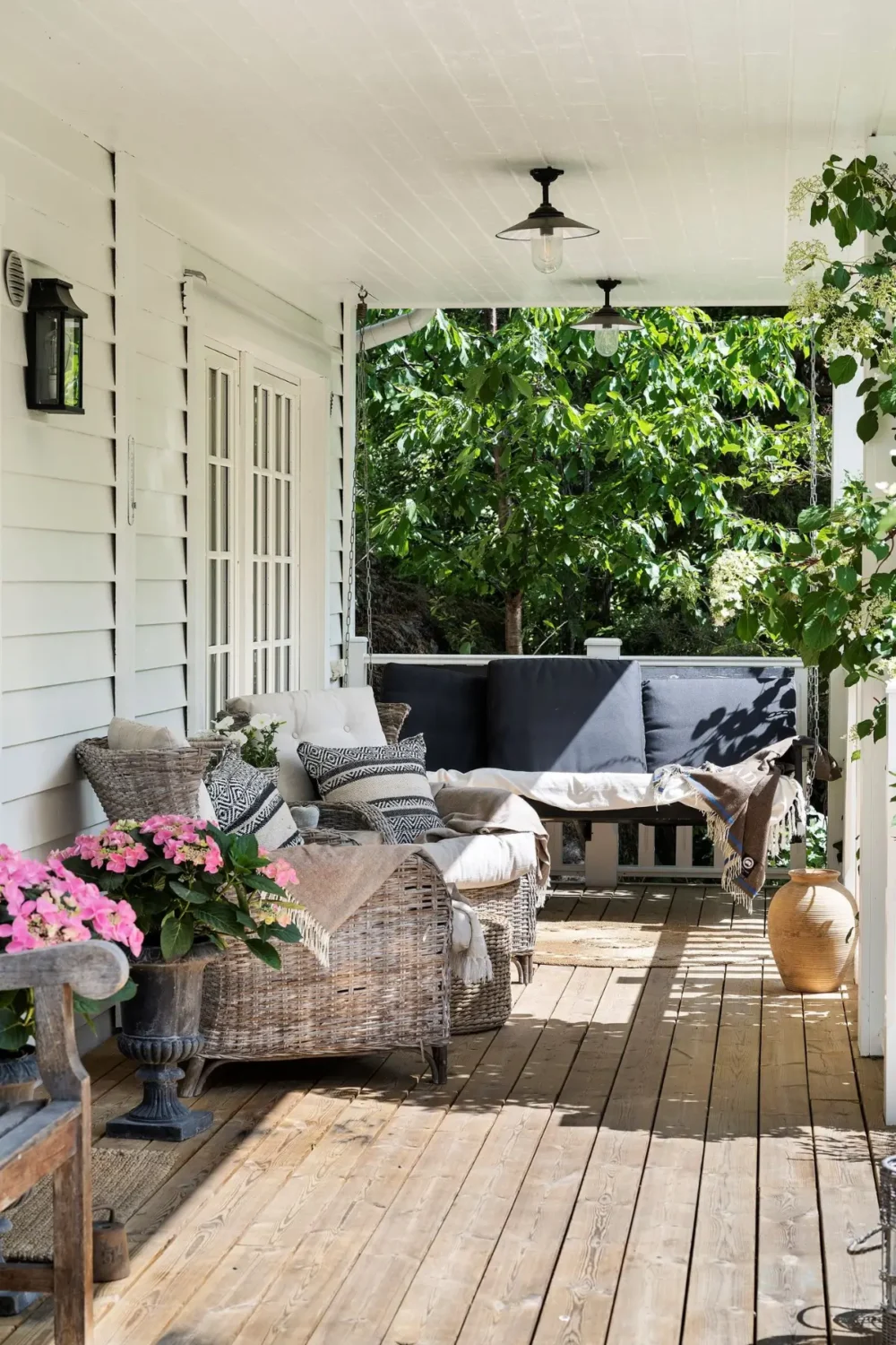 Scandinavian Design Meets The Hamptons in a Swedish Country House 5 hampton-style veranda swedish country house