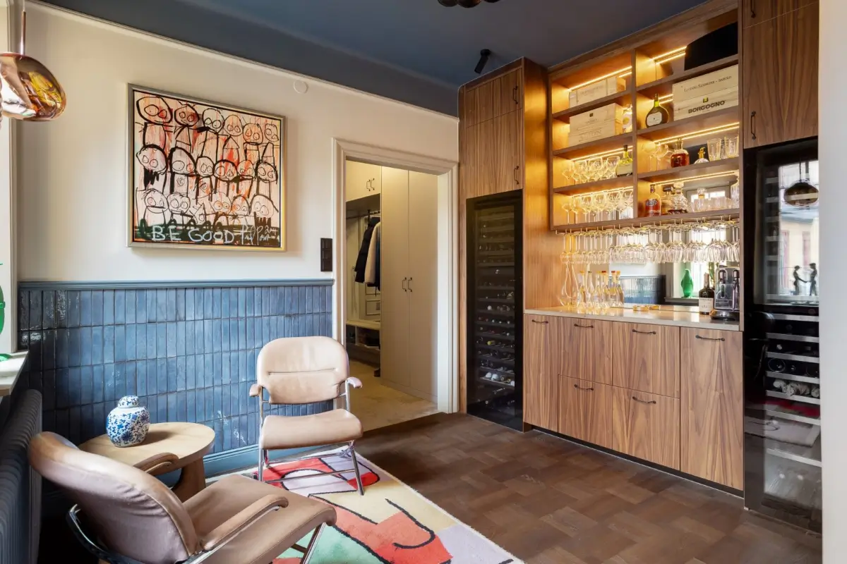 A Harmonious Color Palette in a Luxurious Stockholm Duplex Apartment 7 home bar half-tiled walls