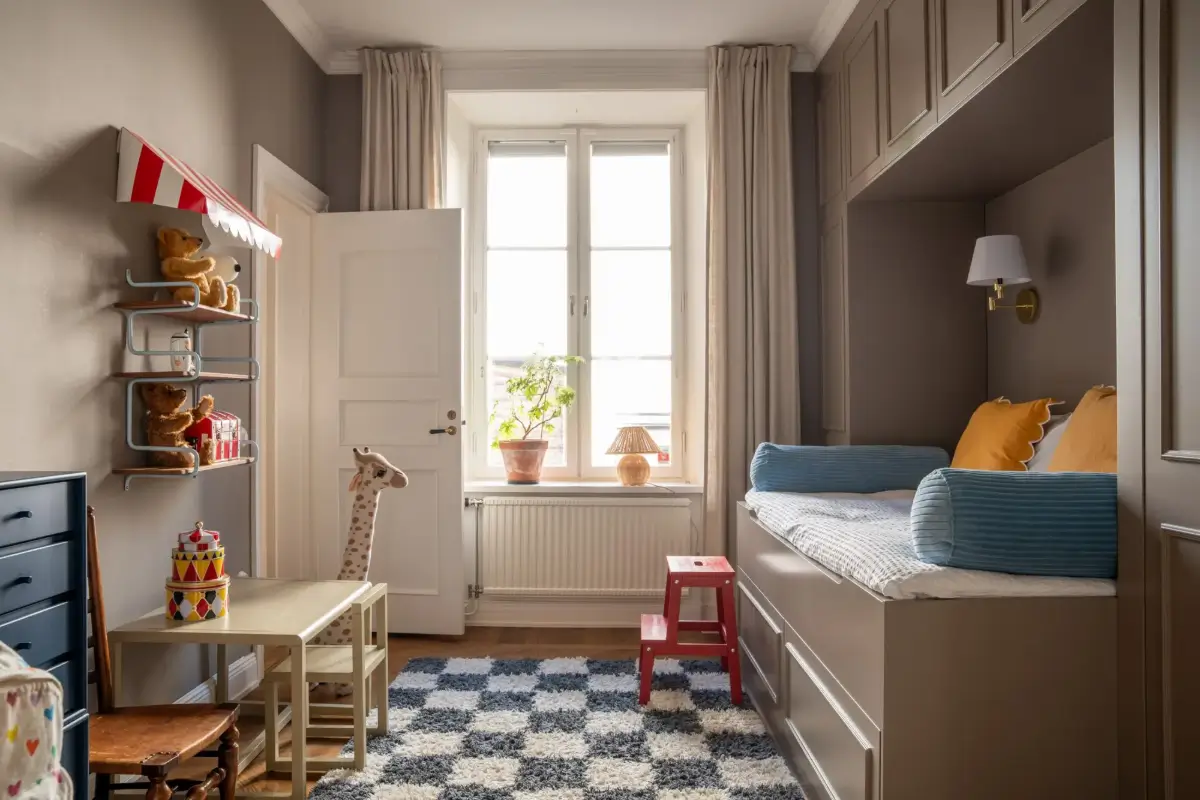 Arched Windows and Design Classics in a 19th Century Apartment 18 kids bedroom built-in bed and storage