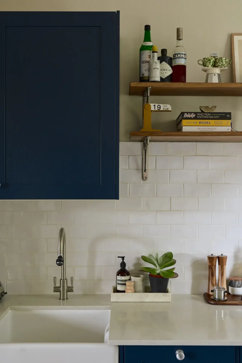 A Classic Victorian Duplex with a Lush, Private Garden in London 13 kitchen detail butler sink shelves