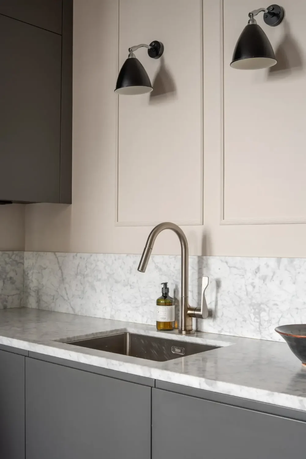 Arched Windows and Design Classics in a 19th Century Apartment 11 kitchen detail marble countertop
