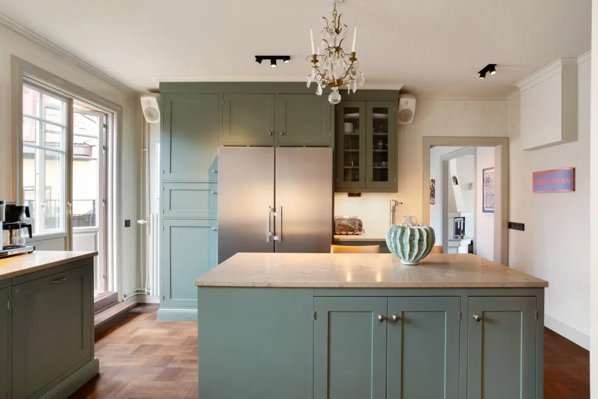 A Harmonious Color Palette in a Luxurious Stockholm Duplex Apartment 10 kitchen island