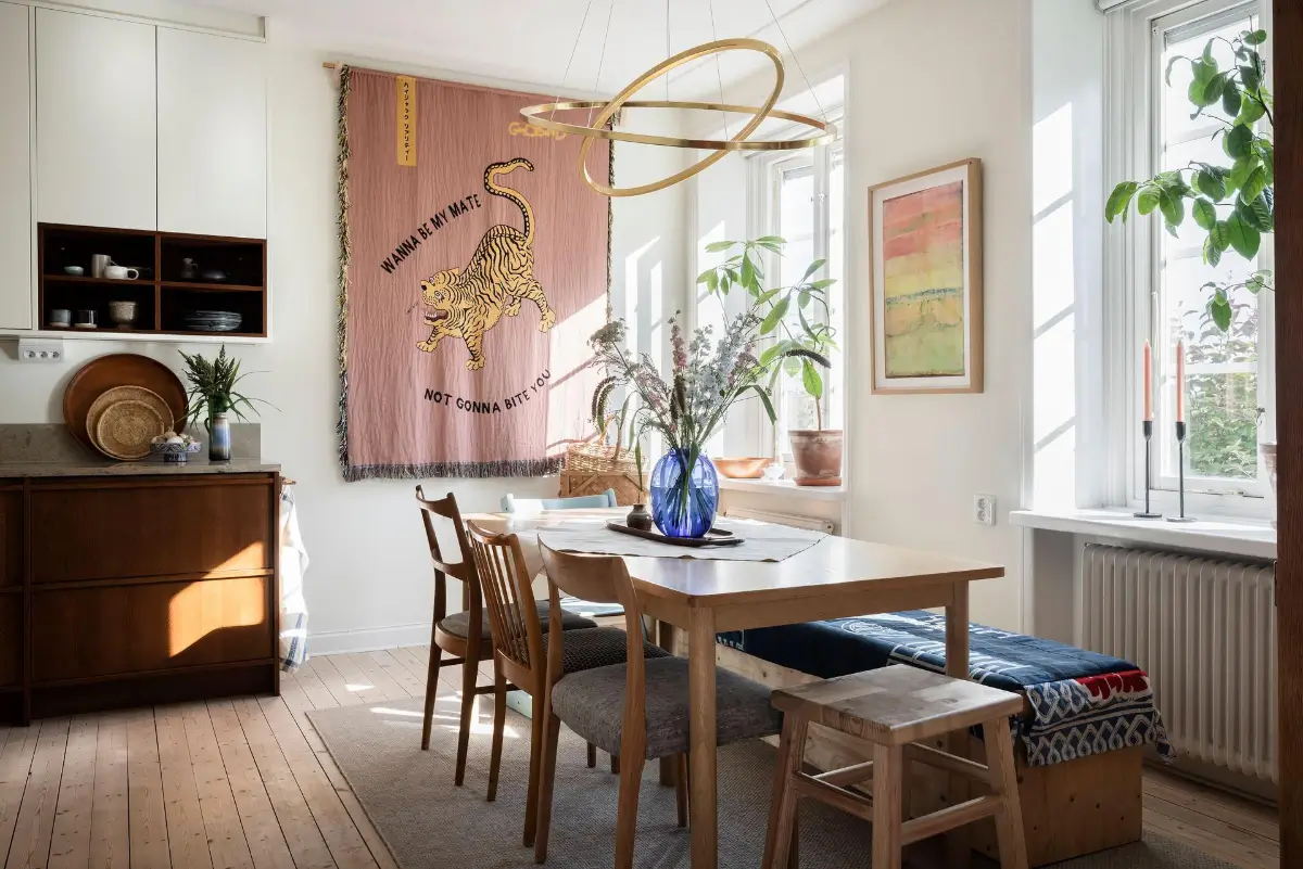 A Colorful 1920s Family Apartment in Sweden 17 kitchen table with bench