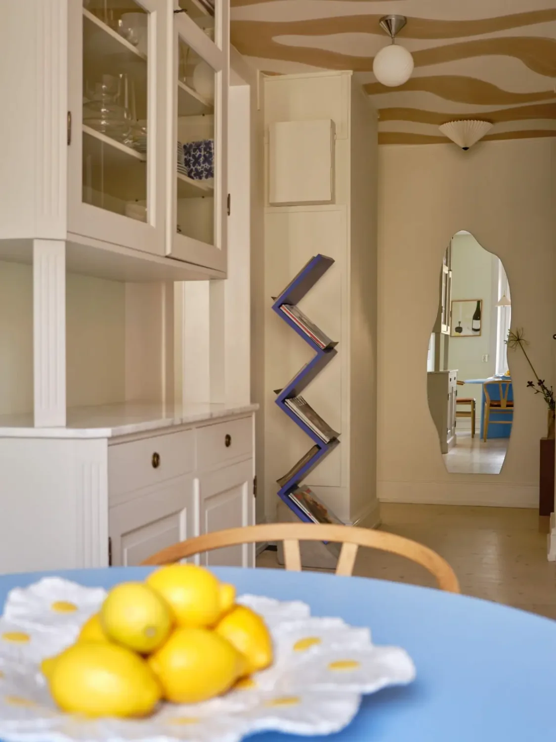 Pastel Hues in a Light-Filled 1880s Apartment in Stockholm 23 kitchen-view-into-hall-wavy-patterned-ceiling-nordroom
