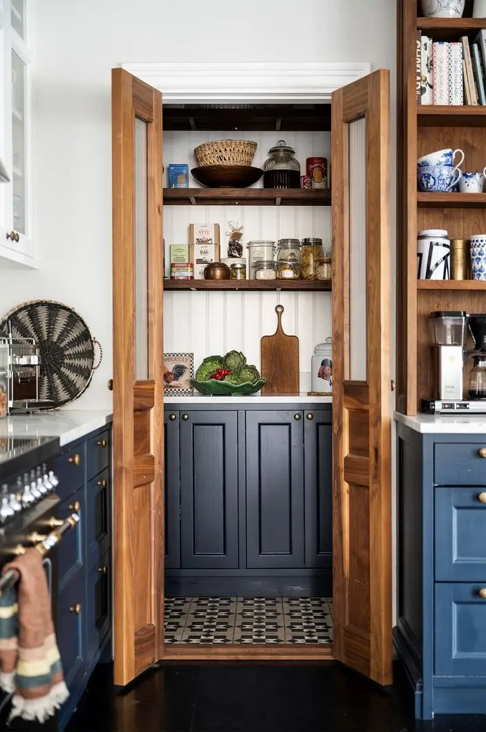 Best of 2025: Kitchens 72 kitchen view into pantry wooden doors nordroom