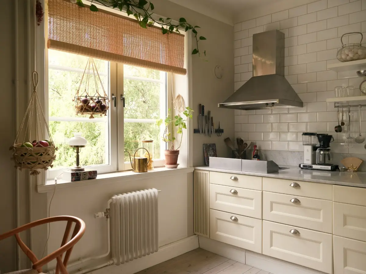A Muted Color Palette in a Cozy 1920s Apartment in Stockholm 7 large kitchen window