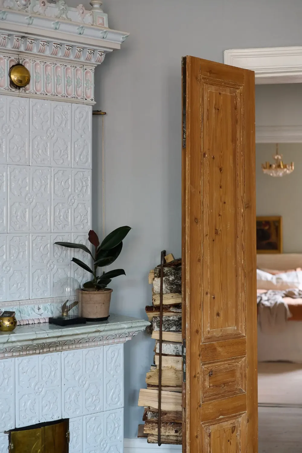 A Classic Stockholm Family Apartment with a Separate Studio 3 light blue fireplace