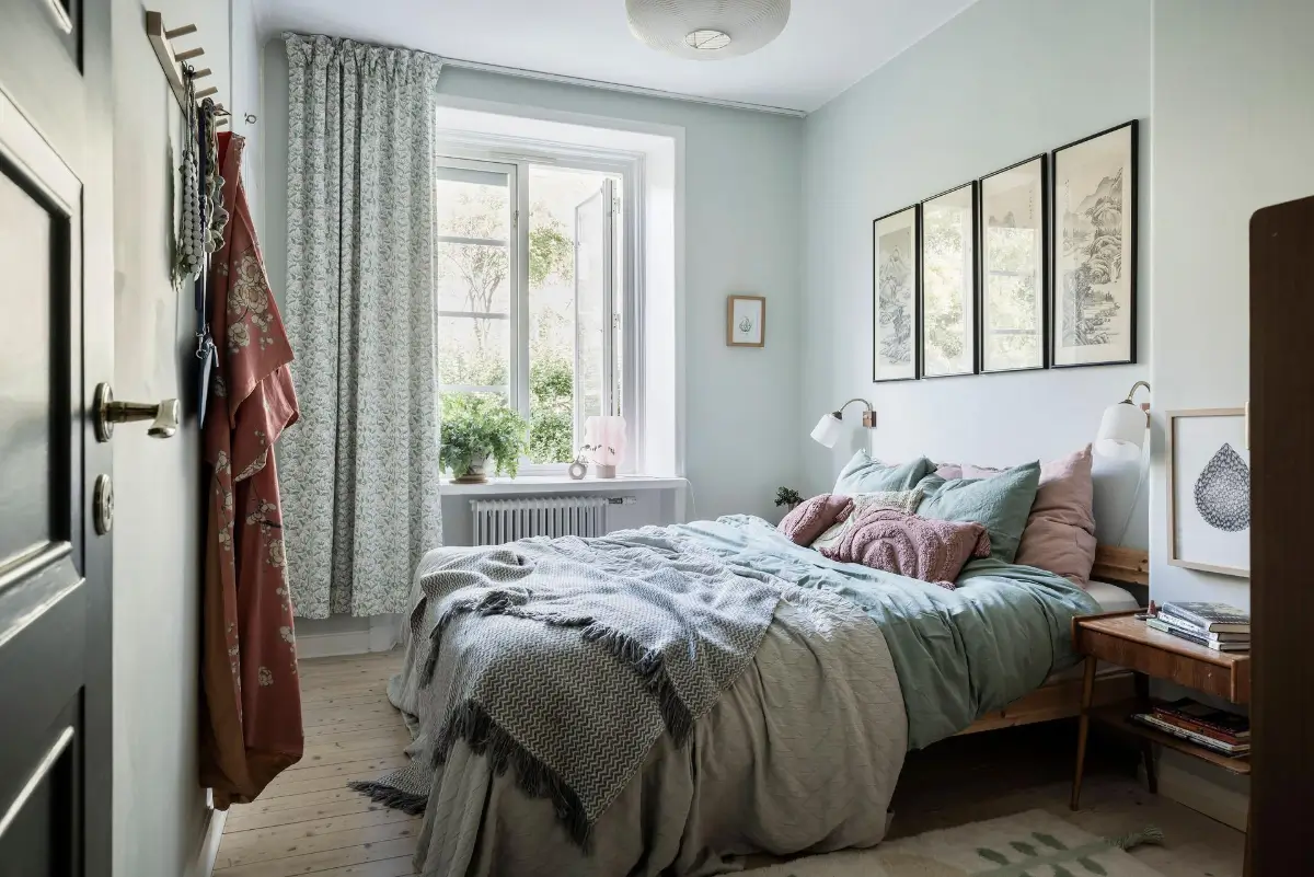 A Colorful 1920s Family Apartment in Sweden 22 light blue-green bedroom
