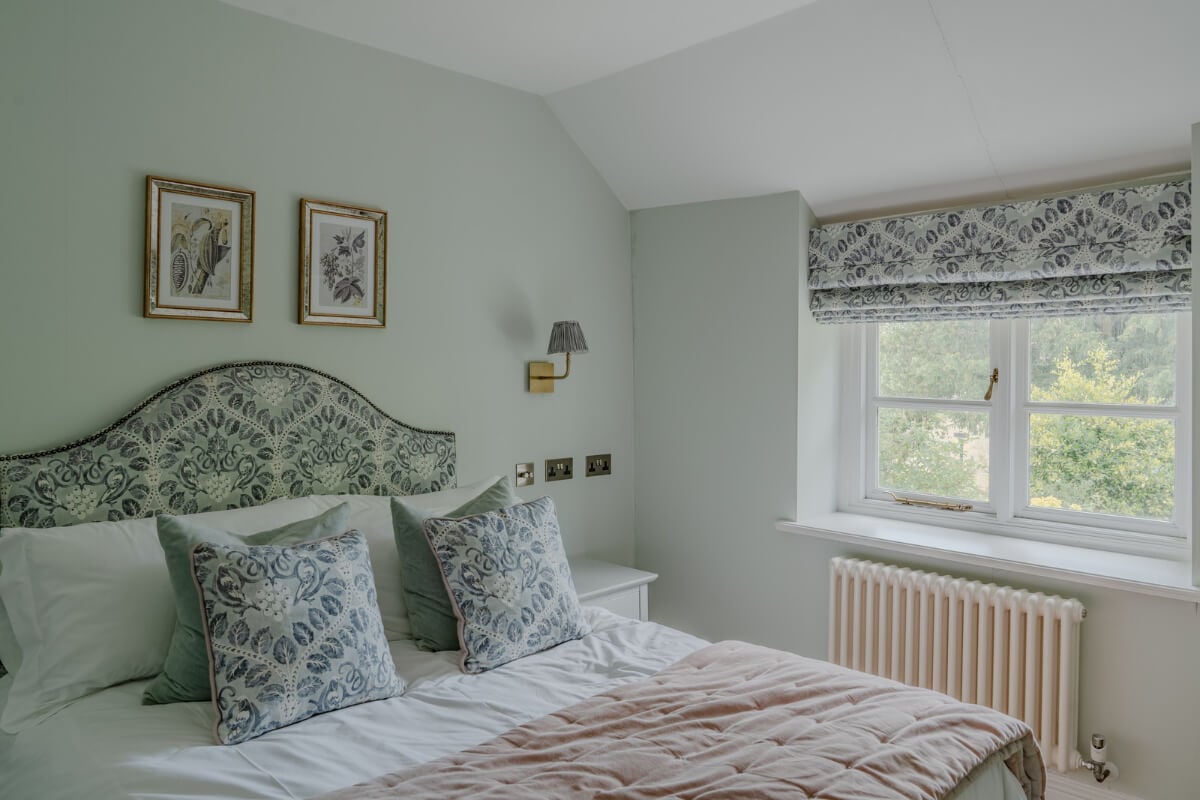 A Stone English Cottage with a Blue and Pink Kitchen 18 light cottage bedroom
