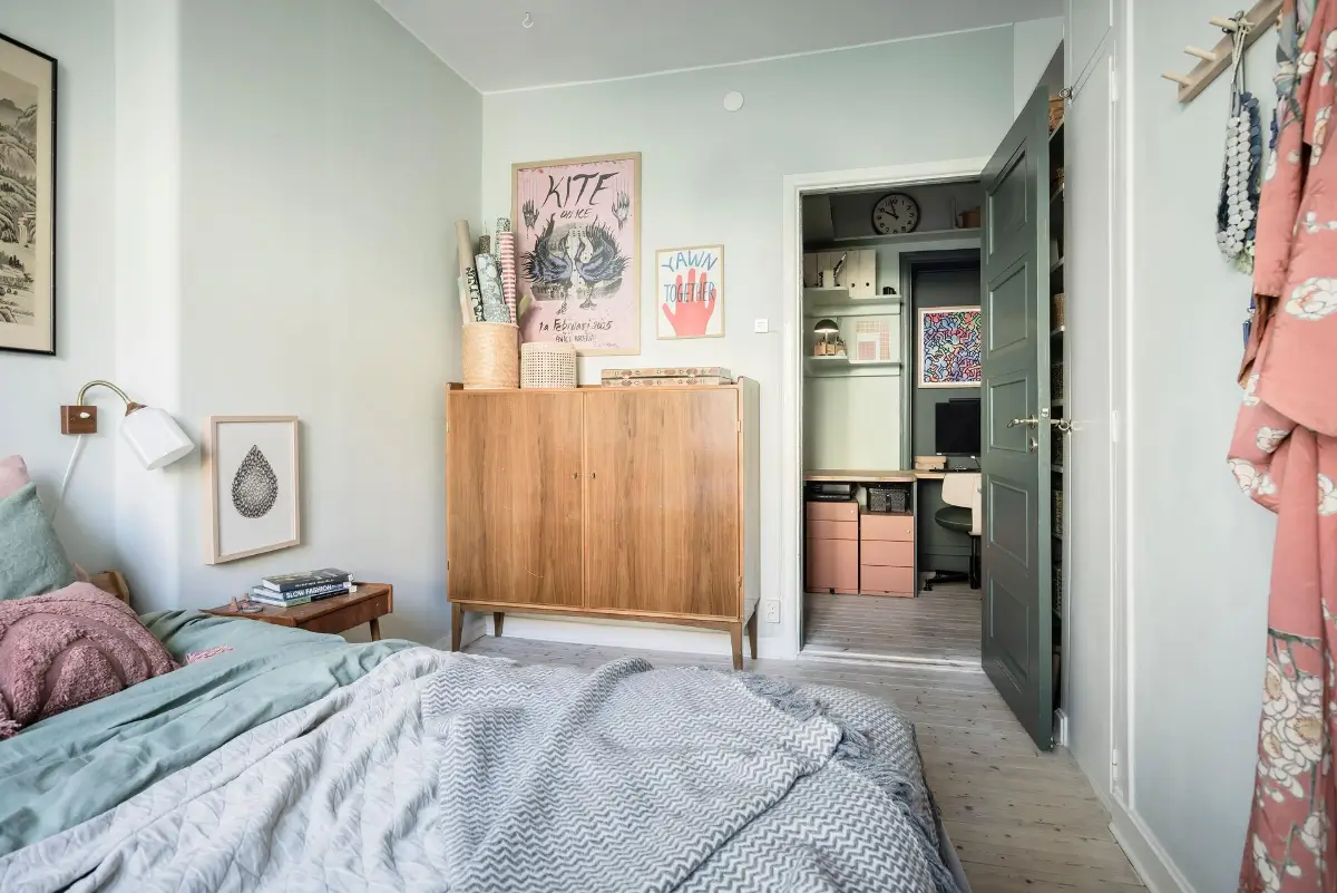 A Colorful 1920s Family Apartment in Sweden 24 light green bedroom