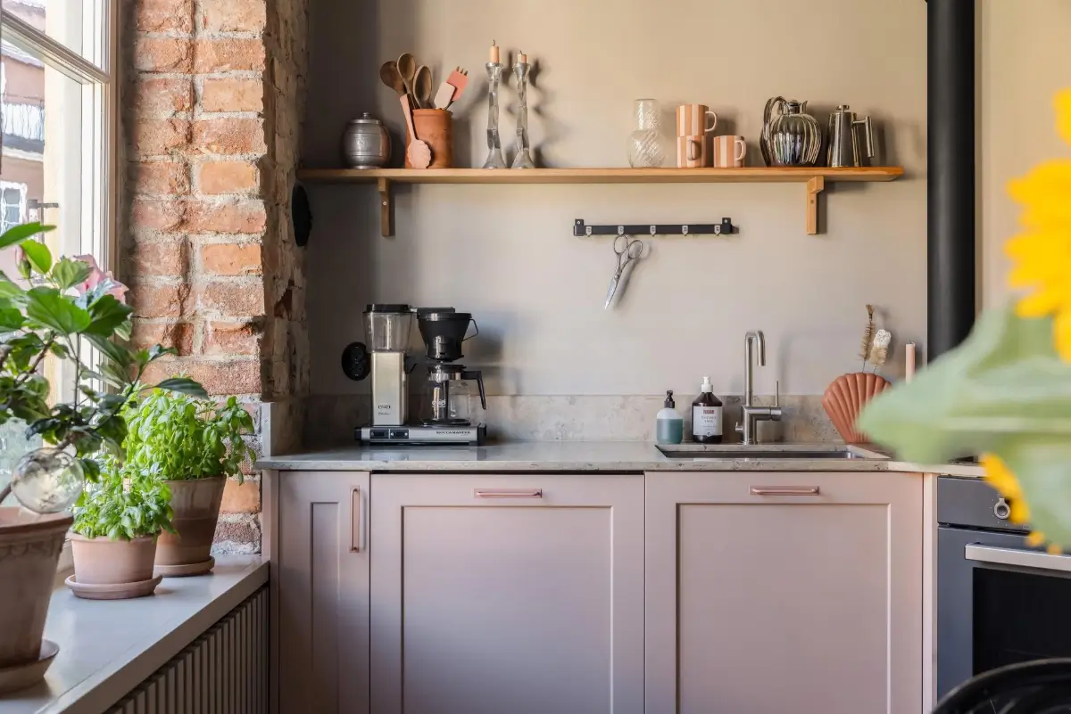 Colorful Rooms in a Practical Stockholm Family Apartment 3 light pink kitchen cabinets