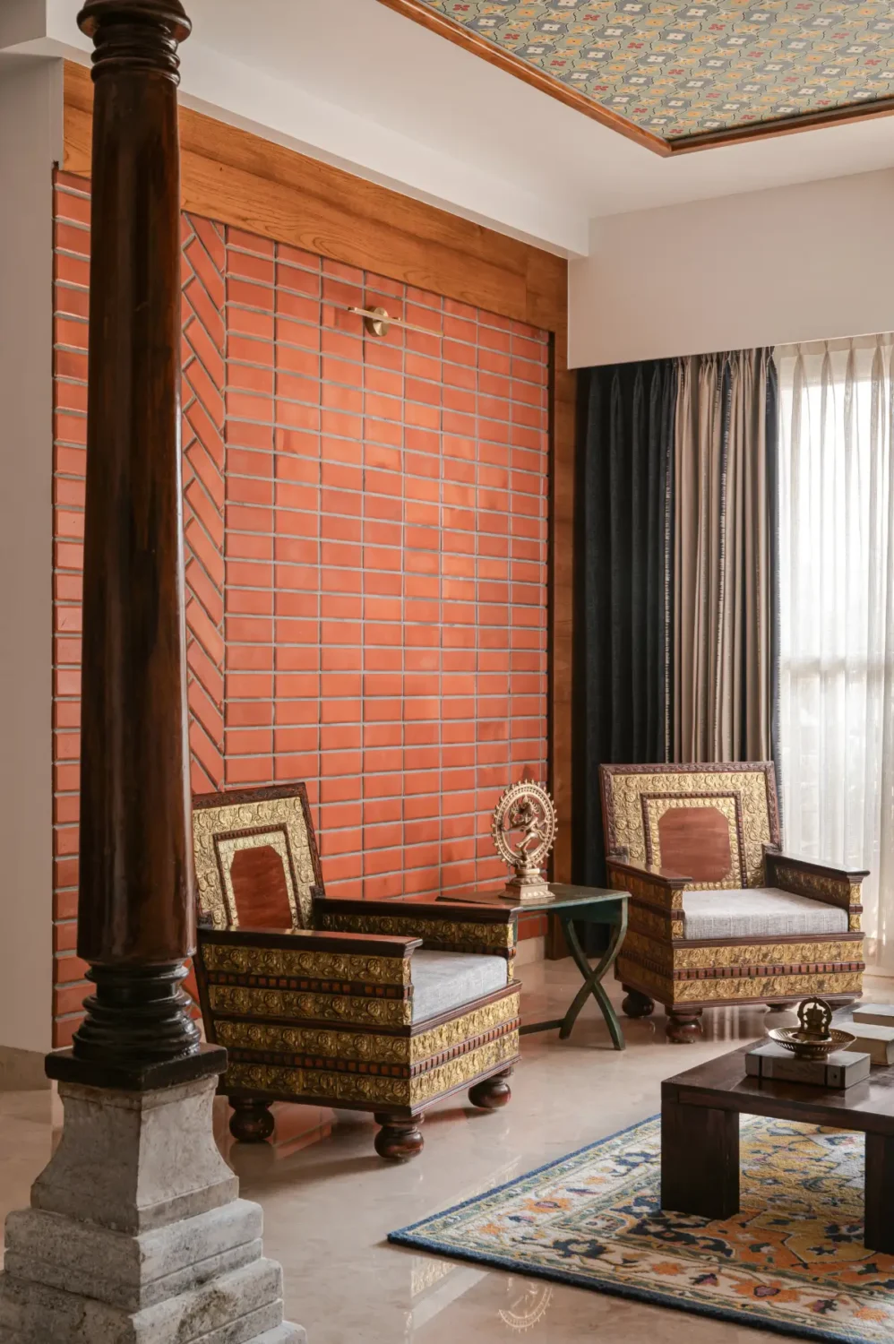 A South Indian Family Home Where Heritage Meets Bold Color Choices 3 living room brick wall