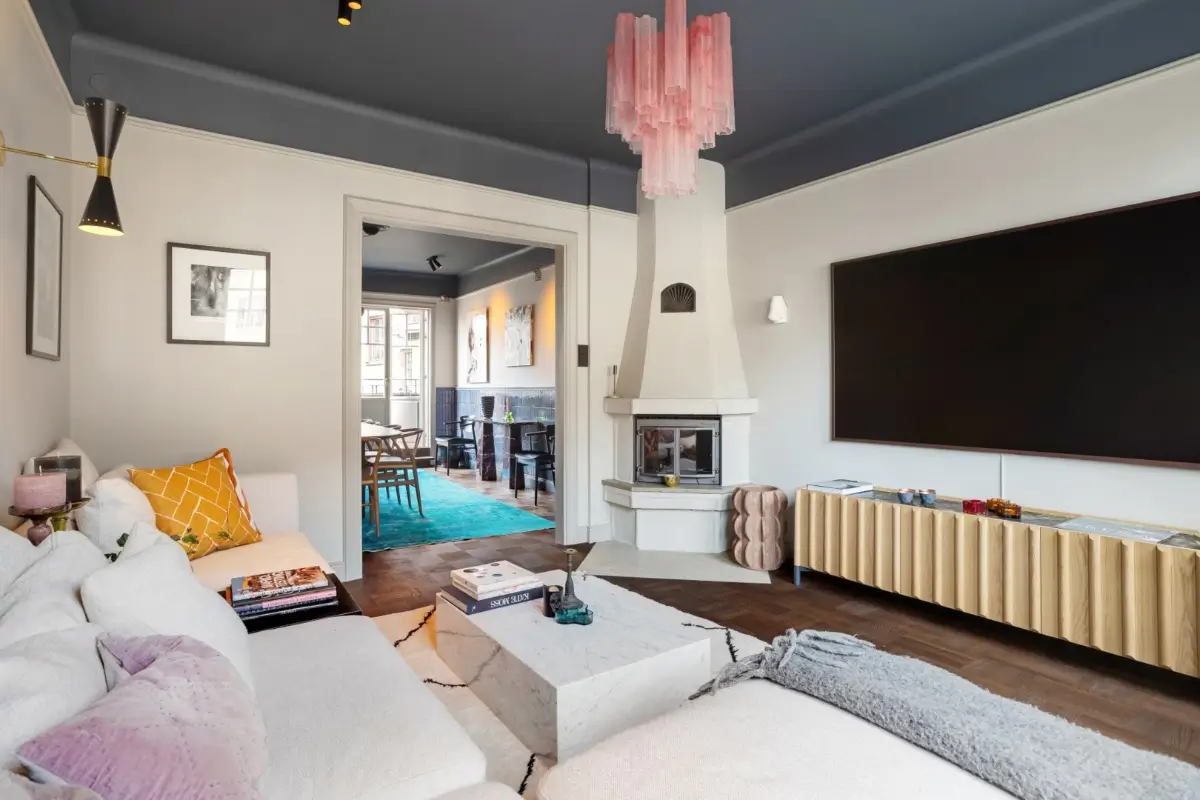 A Harmonious Color Palette in a Luxurious Stockholm Duplex Apartment 2 living room dark blue-gray ceiling