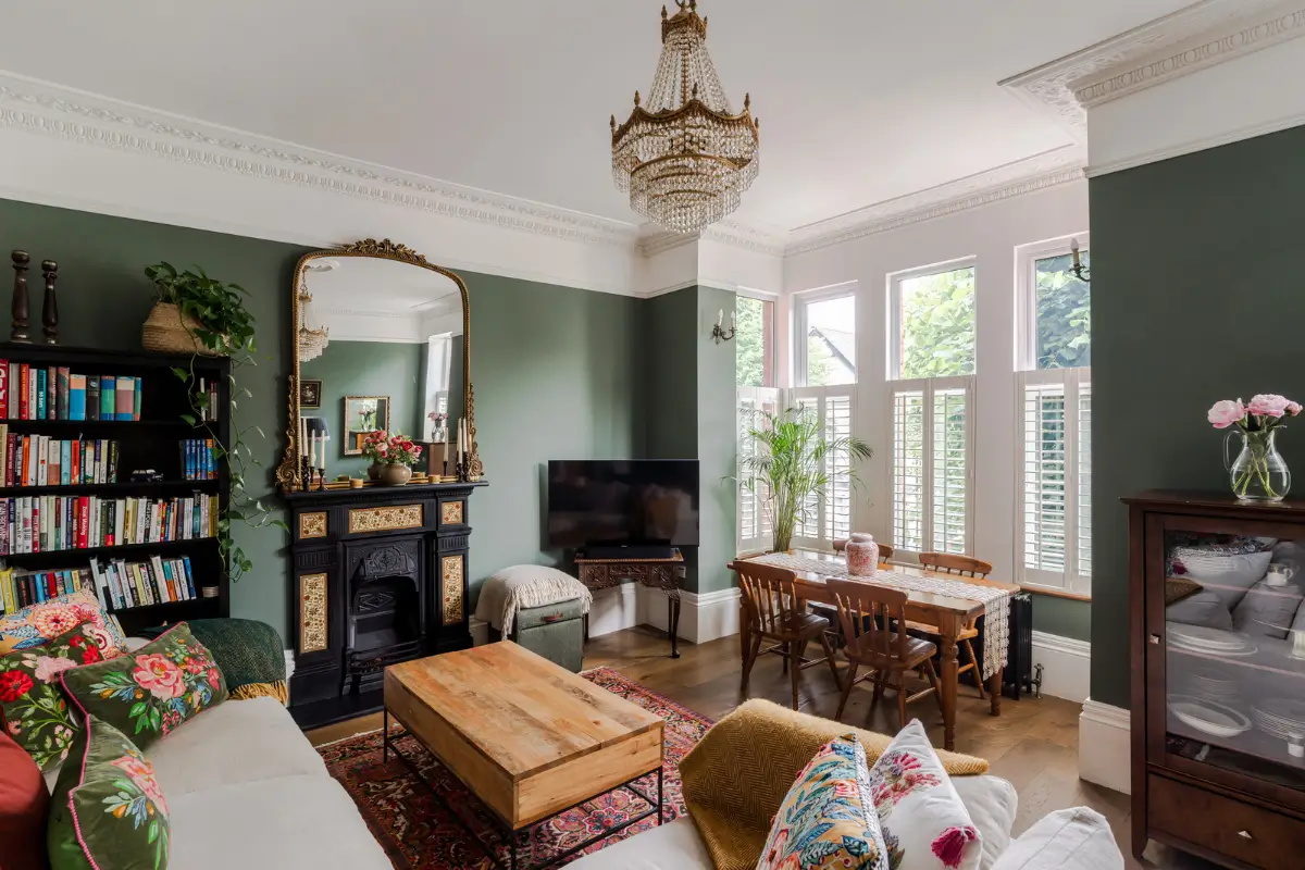 A Three-Bedroom Duplex Apartment with a Large Roof Terrace in London 2 living room green walls box bay window