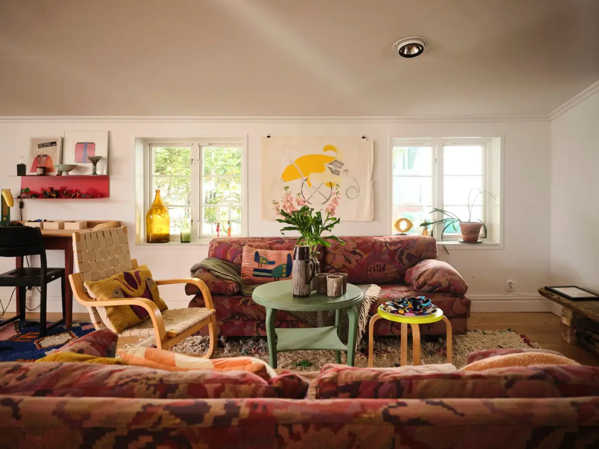A Colorful Family Home in an Old Gardener's Cottage in Sweden 10 living room low ceiling