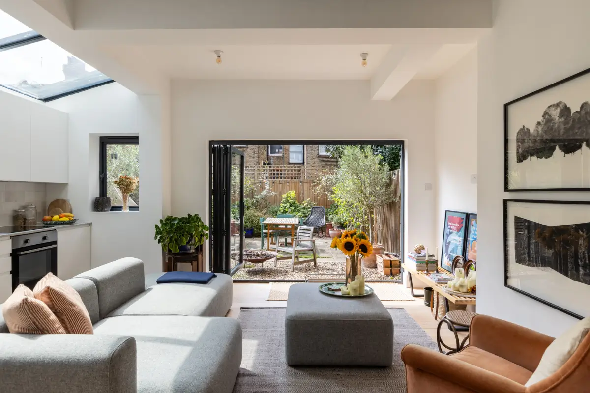 A Modern Extension and Period Details in a Ground Floor London Home 1 open plan extended living space garden doors